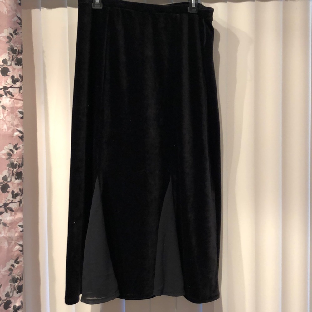 Black long skirt with pleats.. worn once